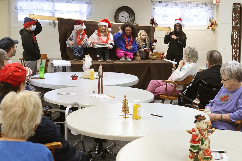 Sixth grade students from Round Lake-Brewster Elementary perform a dance skit for residents of Crossroads Care Center Wednesday morning in Worthington.