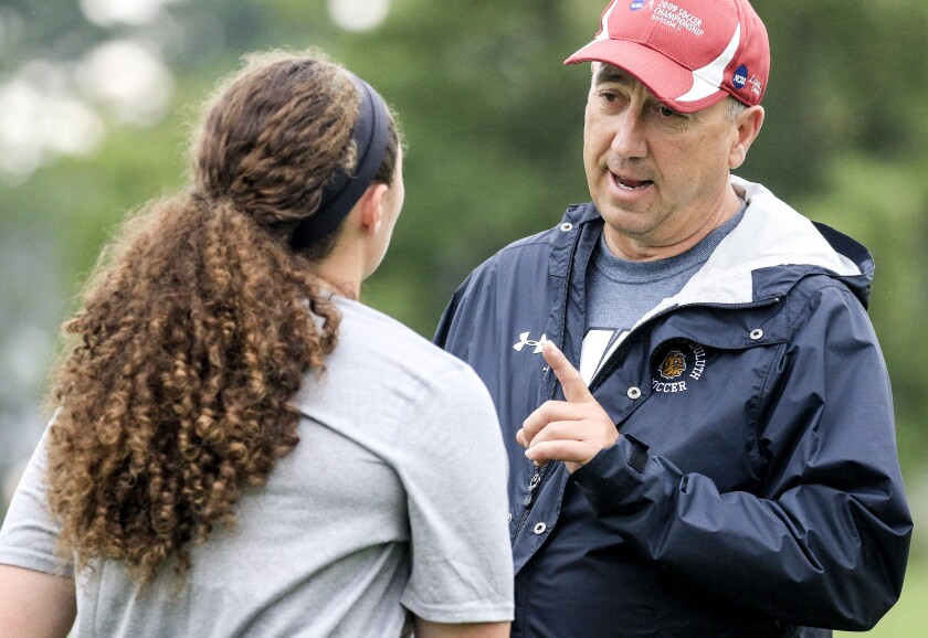 t083118 --- Clint Austin --- 090518.S.DNT.UMDSOCC.C03 --- Minnesota Duluth womens soccer coach Greg Cane talks to Sophie Horn after a recent practice on the grass fields at the University of Minnesota Duluth. --- Clint Austin / caustin@duluthnews.com