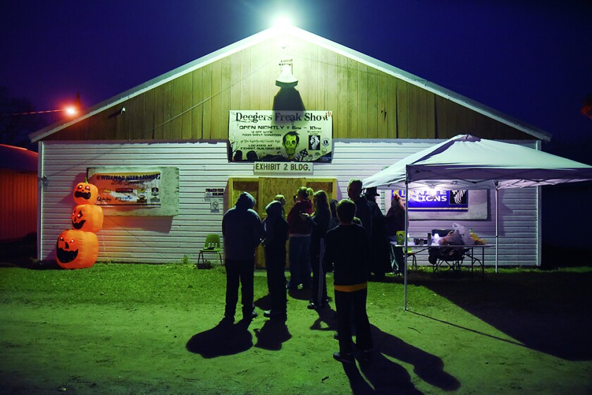 Briana Sanchez / TribunePeople wait in line Sunday night to enter the Deegers Freak Show. The haunted house was put on by the Willmar Noon and Nite Lions. Regular admission is $10. Admission is $8 with the donnation of a canned food item for the Willmar Area Food Shelf.