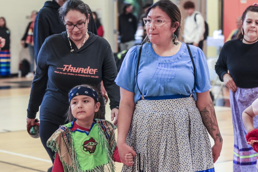 Native Americans participate in powwow