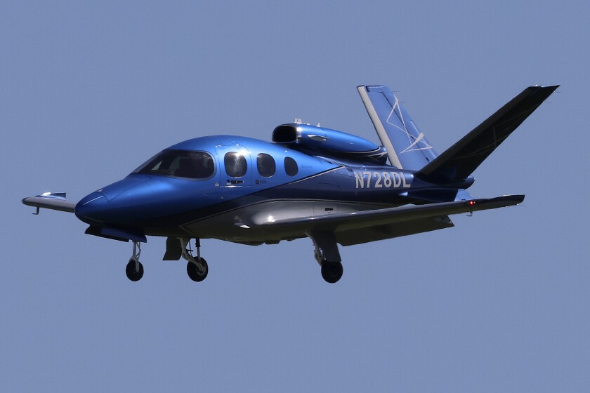 A Cirrus Vision Jet in flight.