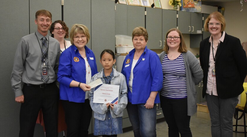 Shameri Drah, a second-grader in Emily Winter's class at Prairie Elementary who won the Wilmont VFW Auxiliary's Illustrating America Coloring Contest, won the regional contest as well on Tuesday, May 17, 2022.