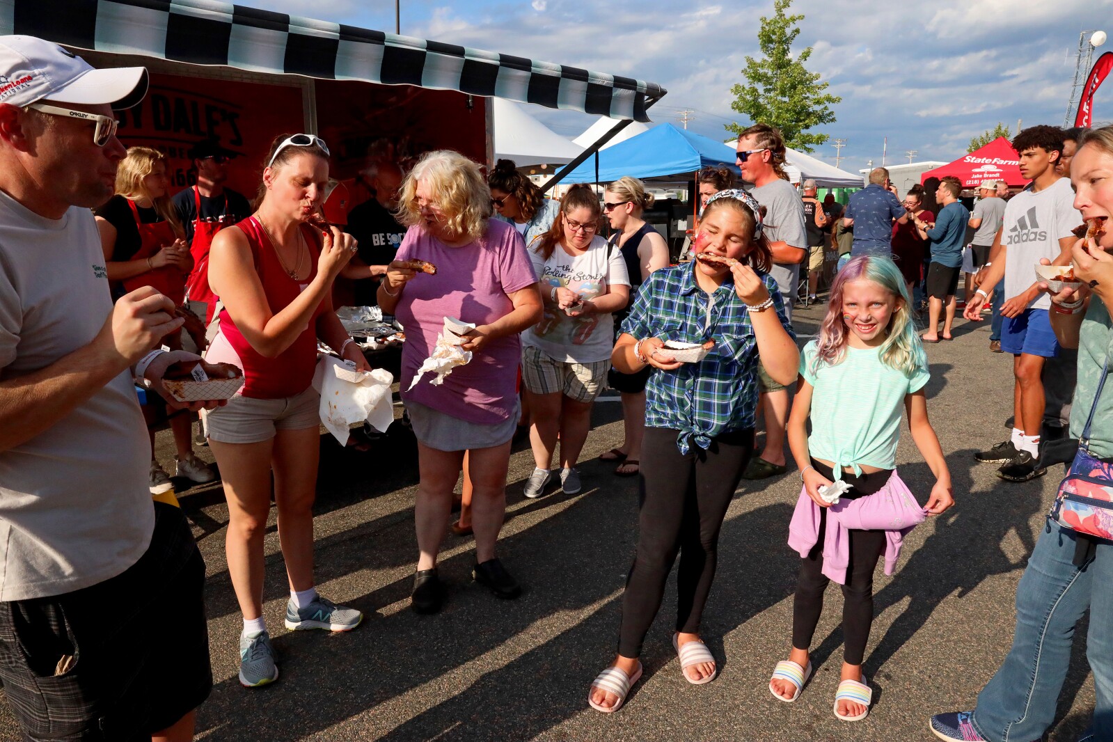 People enjoy the Cub Foods Ribfest during Brainerd Jaycees Street Fest on Saturday, July 23, 2022, in downtown Brainerd.