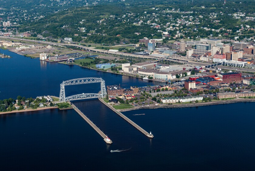 Aerial view of Duluth's Lift Bridge, with the Duluth Entertainment Convention Center seen in background along Duluth Harbor Basin.