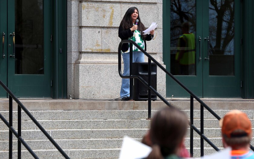 Woman speaks during a protest