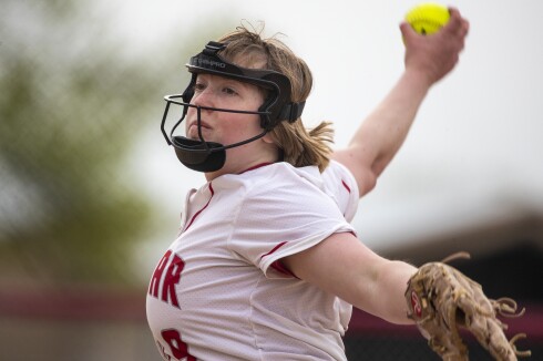 Cardinals junior Grace Bjur pitches as Willmar High School plays host to Sauk Rapids during a Section 8AAA playoff game in Willmar on Tuesday, May 24, 2022.