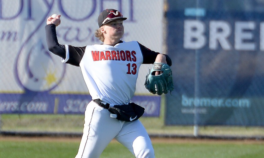 Ridgewwater freshman left fielder Elliot Domagala throws the ball into the infield during Game 2 of an MCAC doubleheader against Alexandria Tech on Friday, May 2, 2025 at Klemmetson Field in Willmar.