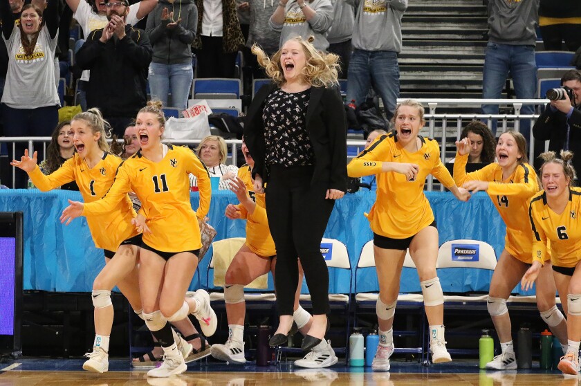 b volleyball state champ game n cass coach celebrate 111922.jpg
