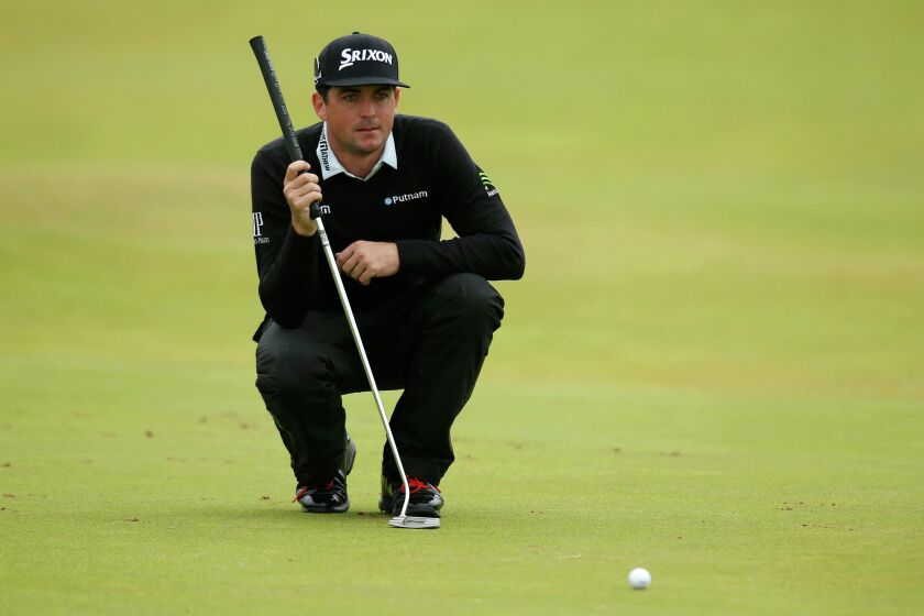 Phil Mickelson of the U.S. lines up a putt on the 12th green during the second round of the British Open at Royal Troon, Scotland. REUTERS/Craig Brough