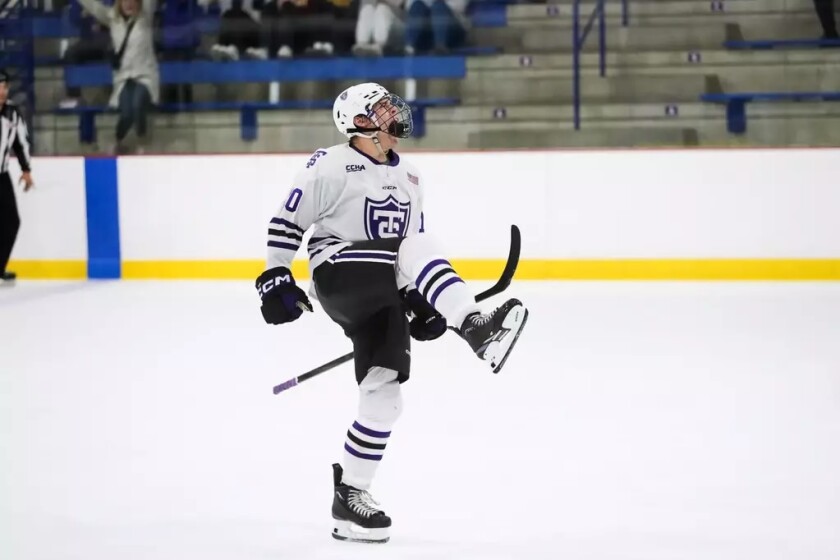 St. Thomas' Mason Poolman celebrates after scoring a goal against Vermont on Friday, Oct. 11, 2024, at Saint Thomas Ice Arena in Mendota Heights, Minn.