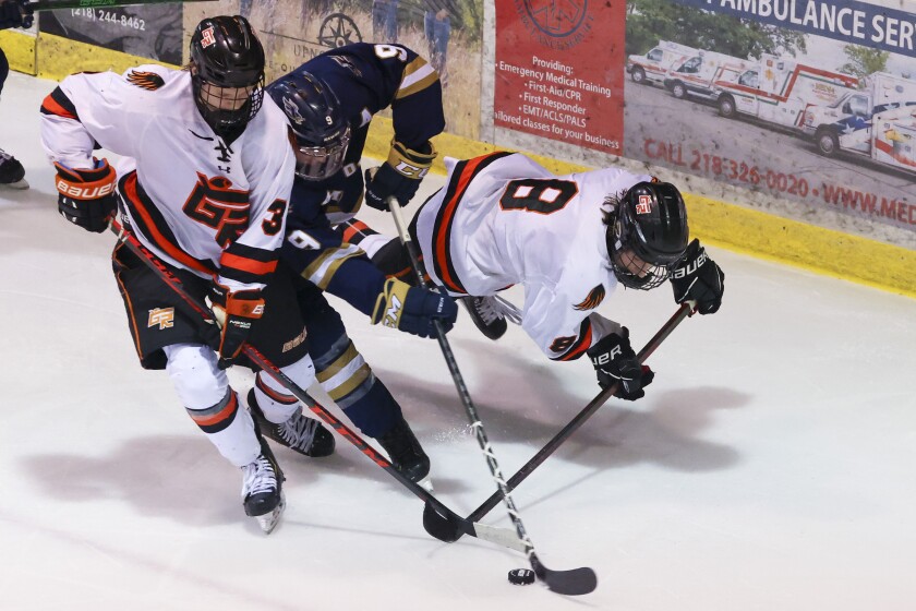Hermantown boys hockey faces Grand Rapids at the IRA Civic Center.