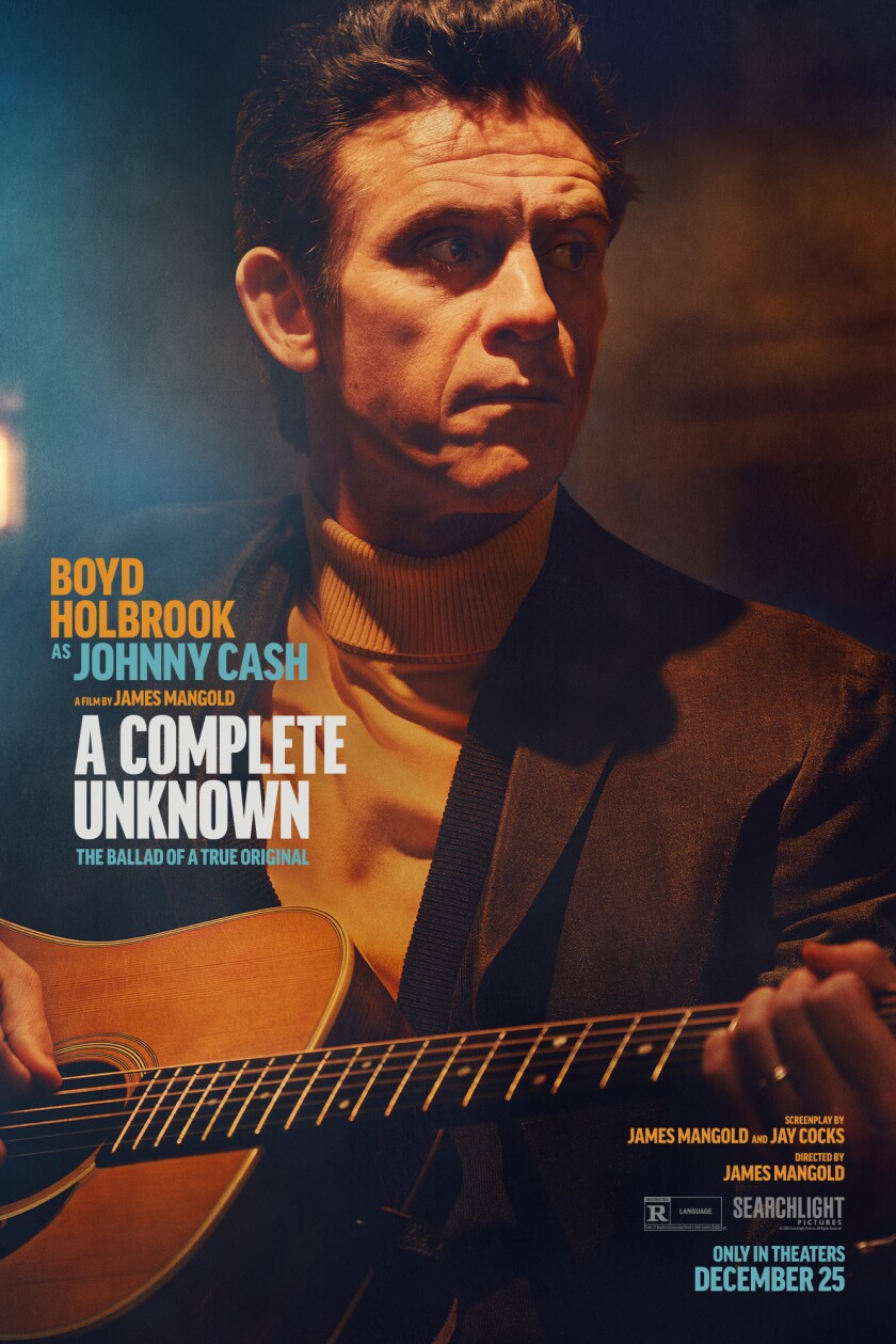 Promotional poster for movie "A Complete Unknown" features image of white man in his 40s playing acoustic guitar, advertising "Boyd Holbrook as Johnny Cash."