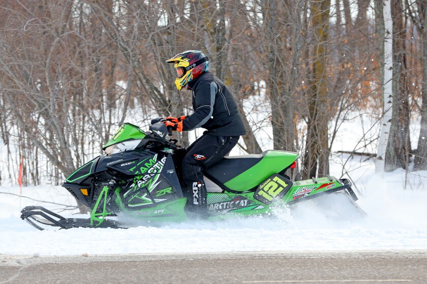 Snowmobilers race