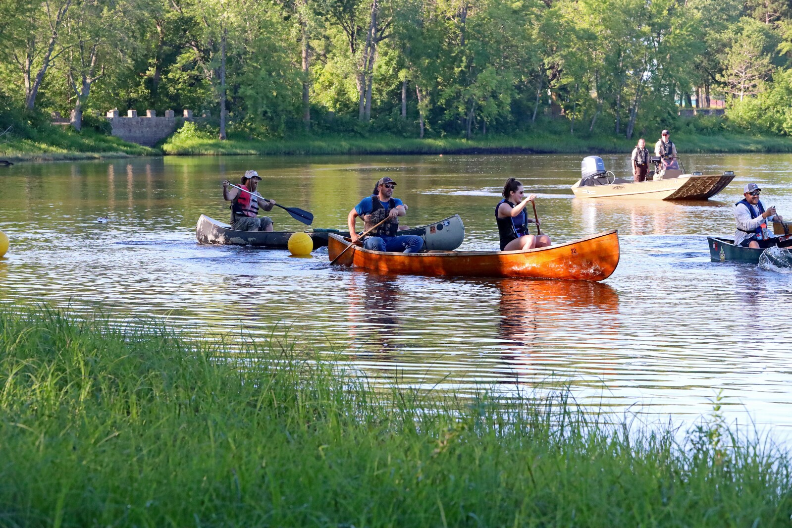Racers head up the Mississippi River on Saturday, July 30, 2022, going from Kiwanis Park to Evergreen Landing and back again in Brainerd.