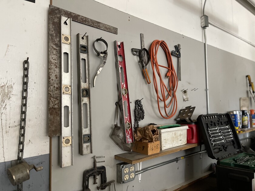 Workshop tools are assembled on a wall inside the workshop at North Dakota State University's Dickinson Research Extension Center.