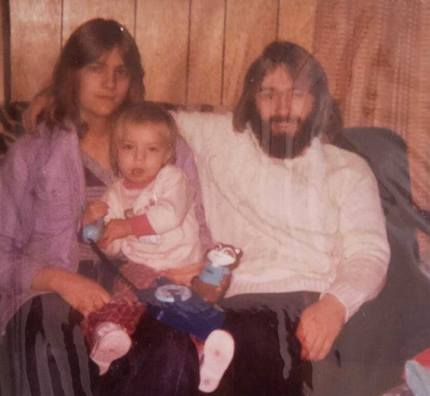 Tina Marcotte and Patrick Gleason, boyfriend or common-law husband, with one of her three children..jpg