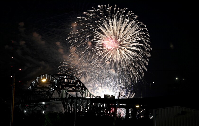 Fireworks from Duluth’s Fourth Fest light up the sky over the Blatnik Bridge