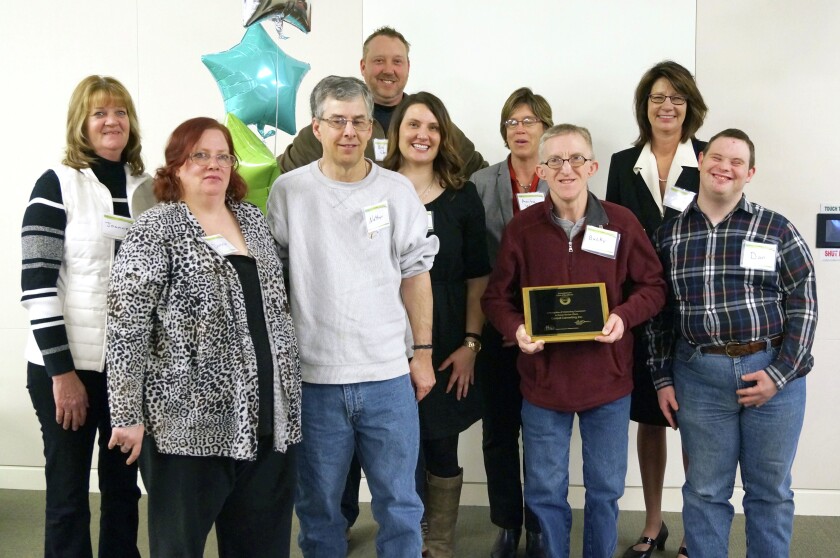 Central Converting, Inc., was honored Friday, Dec. 4, at the 2015 Commissioner’s Circle of Excellence Awards. Back row, Quality Enterprises job coach Joanne Munsch (left), Central Converting owner Bill Wessel, Central Converting office manager Jenna Johnson, Anita Walker of Minnesota State Operated Community Services, Department of Human Services Commissioner Lucinda Jesson. Front row: Quality Enterprises clients Donna (left), Nathan, Bucky and Dan. (Submitted photo)