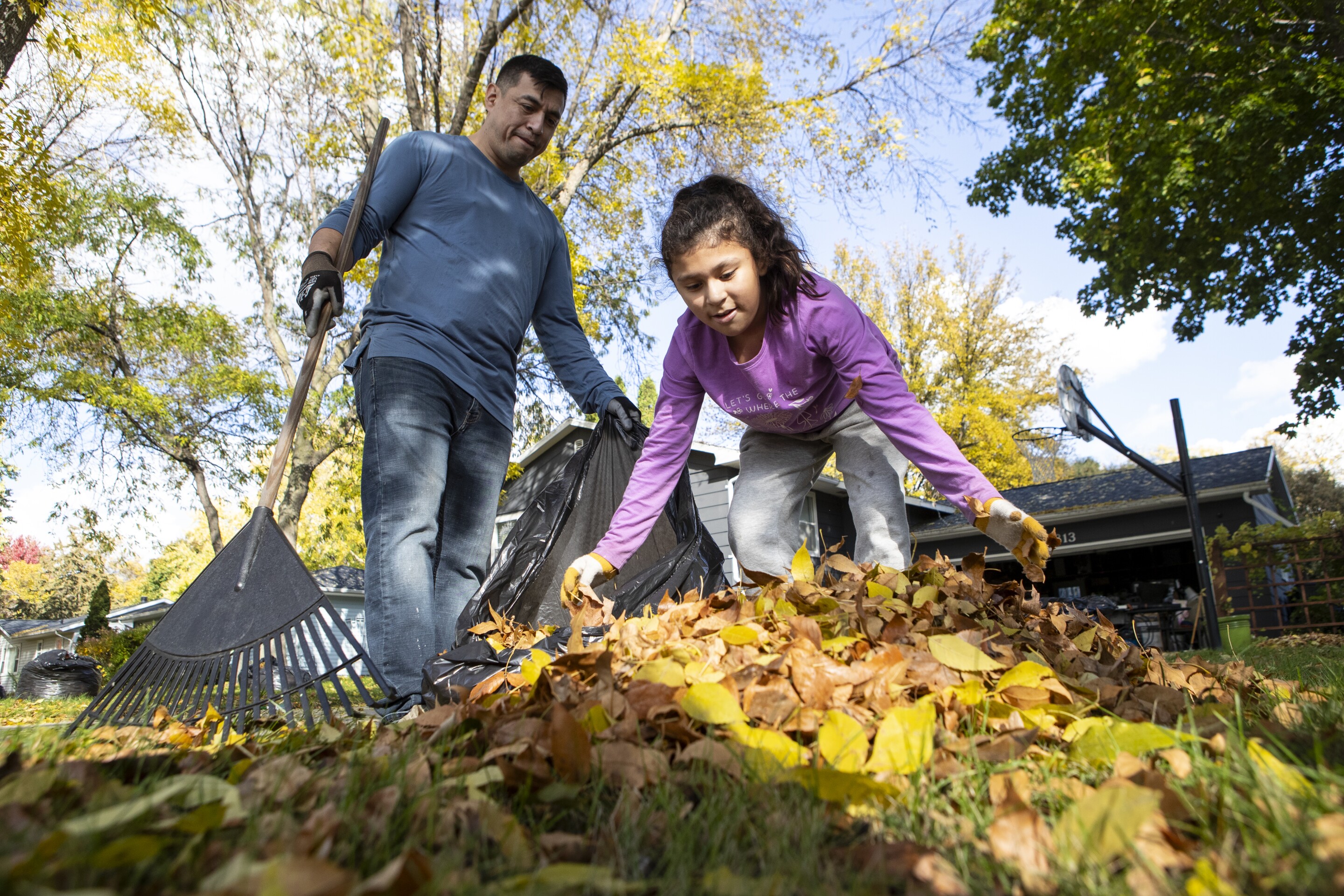 Photos: Warm fall weather makes for fall leaf fun in the front yard ...