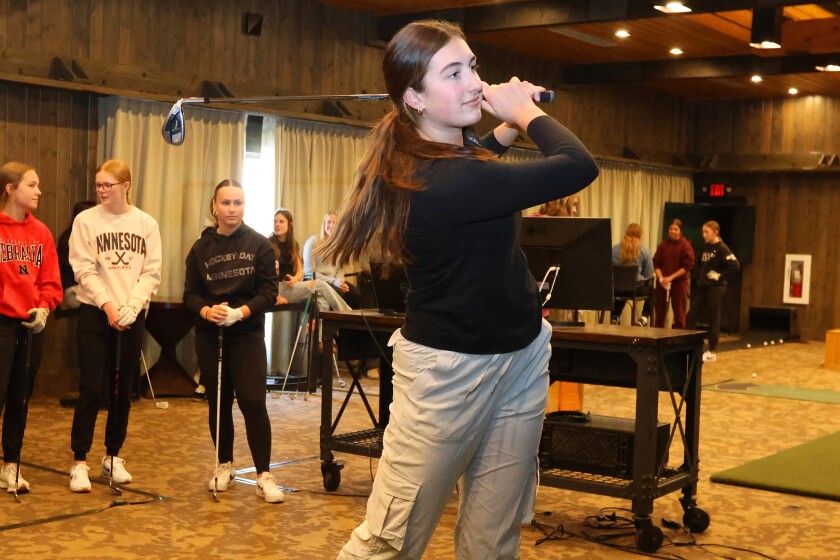 Karley Dunham practices her swing during golf practice on Wednesday, April 9, 2025, at Madden's Resort.