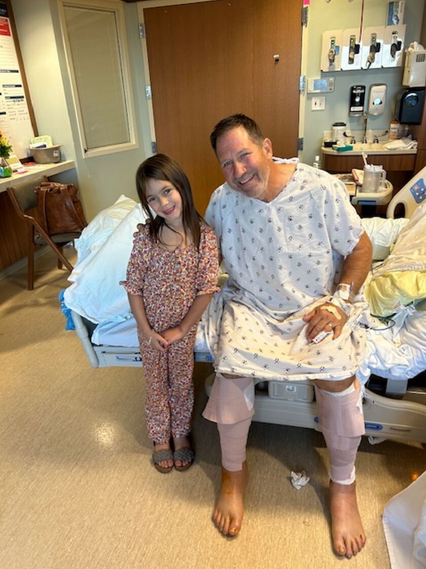 Jawaski_Cambri Christiensen visits her Papa Jim in the hospital. Cambri and her kindergarten class prayed as the ambulance drove by her school on Sept. 27, 2023, not realizing it was on its way to rescue her grandp.jpg