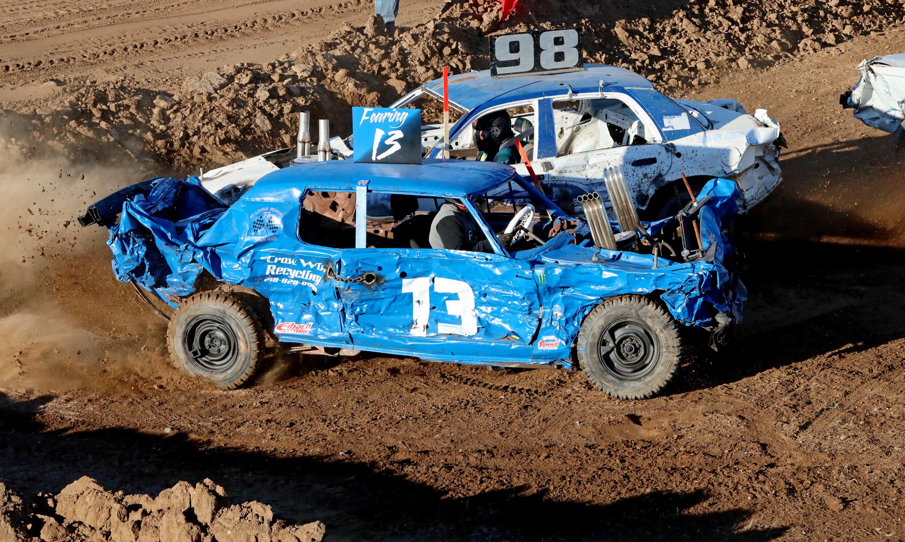 Demo derby cars compete