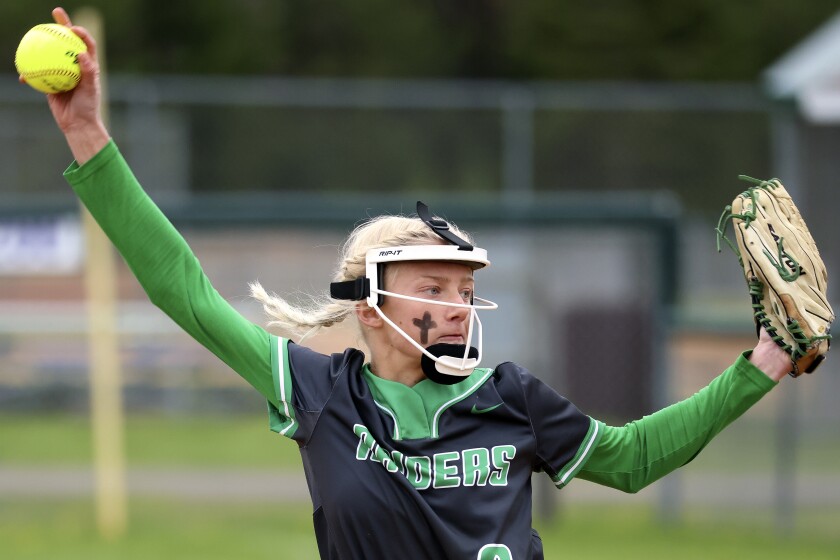 Softball action.