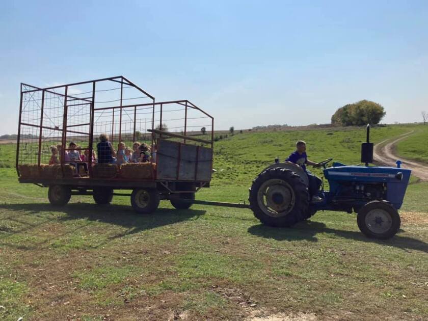 Scott Ripley gives hay rides at Sam's Pumpkin Patch.jpg