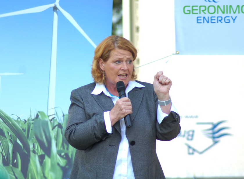 Sen. Heidi Heitkamp accepted a Wind Champion Award Wednesday at Courtenay. Keith Norman / The Sun