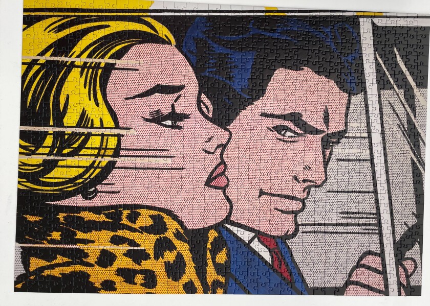 Comic page style jigsaw puzzle featuring a man and woman.