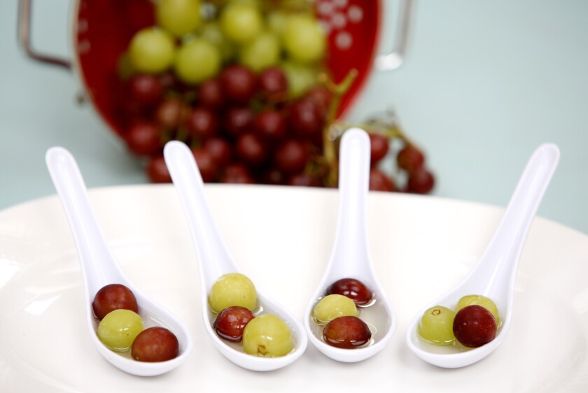 Crostini with Brie, honey, fresh thyme and roasted grapes. Michael Vosburg / Forum Photo Editor