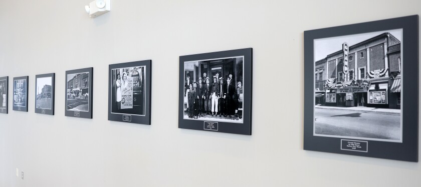 Photos from Worthington historic theaters of the past decorate the walls of the main lobby of the New Grand Theatre, courtesy of the Nobles County Historical Society.