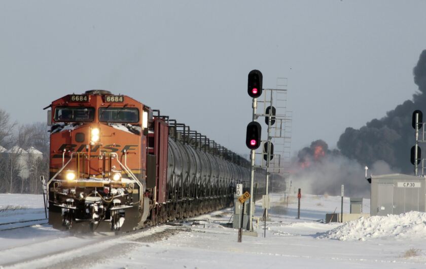 A two-mile Canadian Pacific train loaded with oil tank cars idles on a track in Enderlin, N.D., Nov. 14, 2014. REUTERS/Ernest Scheyder