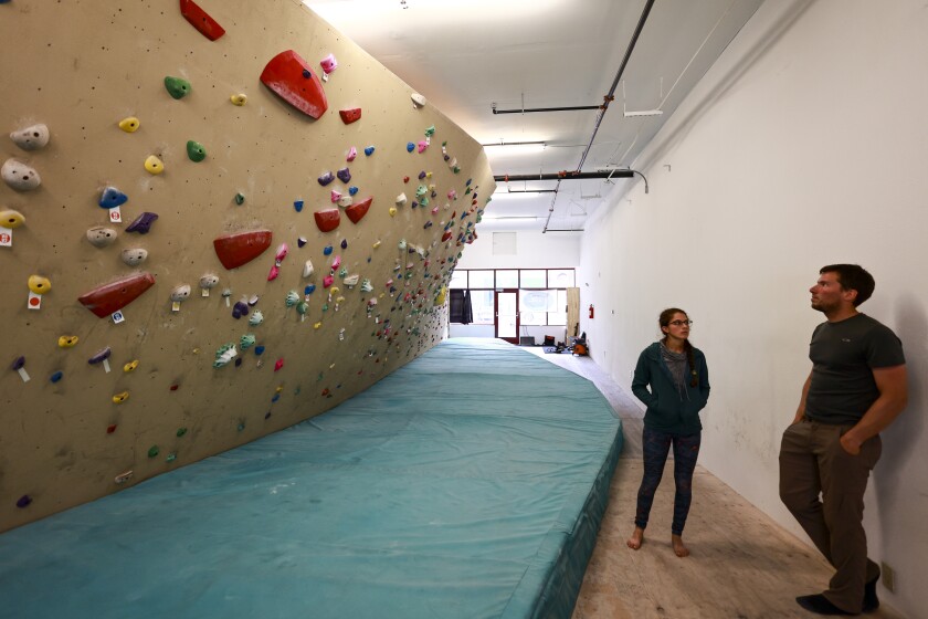 People using indoor climbing wall