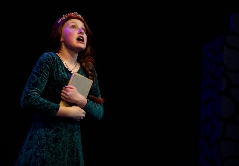 Teen Fiona, played by Brooklyn Pederson, performs during a dress rehearsal for Shrek the Musical at the Barn Theatre on Saturday, June 4, 2022.