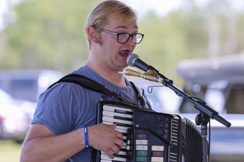 man performs with accordion