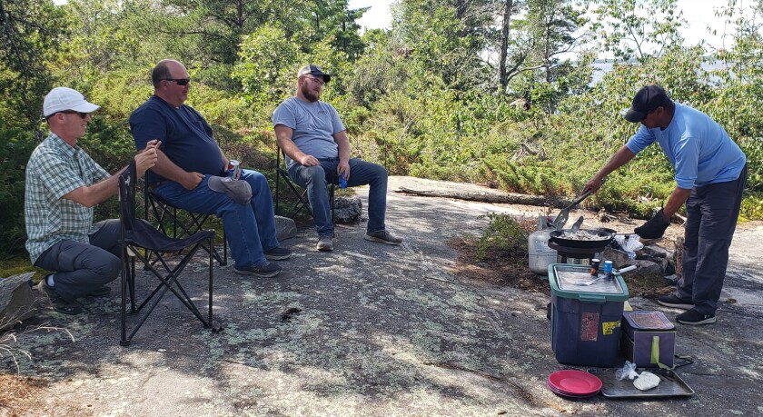 Ron Dewey and Erick with Reuben.jpg
