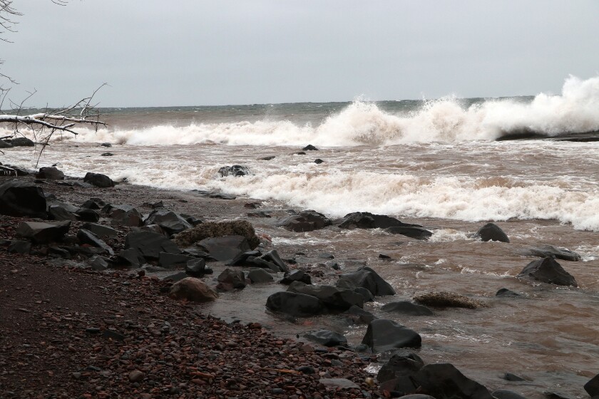 Waves rush towards shore.