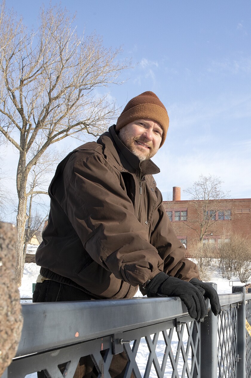 Aaron Tank, the producer and editor of The Vessel, stops at the Lincoln Park Bridge