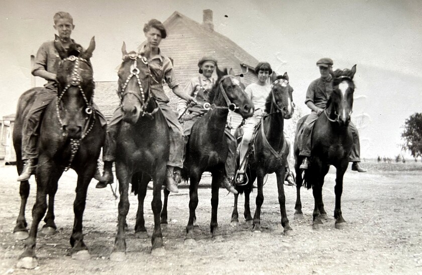 Eldon Petersen (middle) is shown with Henry Cramer (from left), Thee Wiseman, Mary Grace Wiseman and Walter Wiseman.
