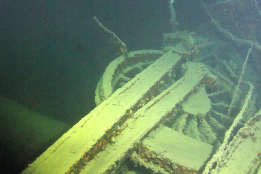 In this image taken by a remotely-operated vehicle, the wheels of Locomotive 694 -- with drive arm still attached -- are seen about 235 feet beneath the surface of Lake Superior near Marathon, Ontario, in July 2016. (Photo courtesy of Tom Crossmon)