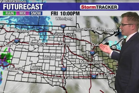 Accumulating Snow moves through the region