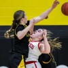 high school girls play basketball