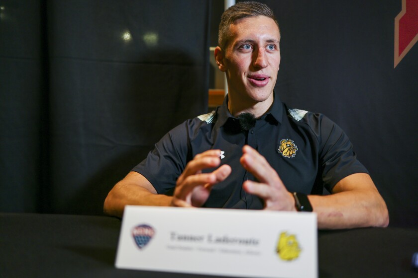 Interviewing college hockey players and coaches