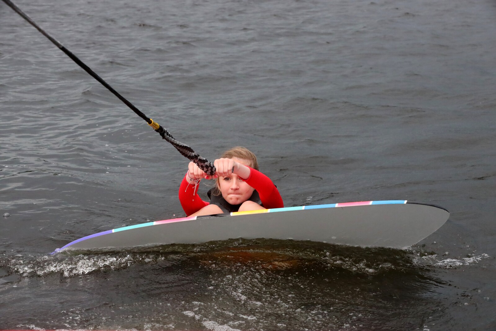 Savannah Mendell demonstrates wake surfing for people during the ninth annual Bar Harbor In-Water Boat Show on Saturday, June 18, 2022, on Gull Lake. Watercraft for the boat show were brought by Nisswa Marine and Minnesota Inboard Water Sports and a Wake Responsibly event taught attendees boat safety and responsibility.