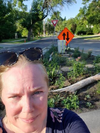 Amy Anderson selfie in front of the Daily Park in Moorhead