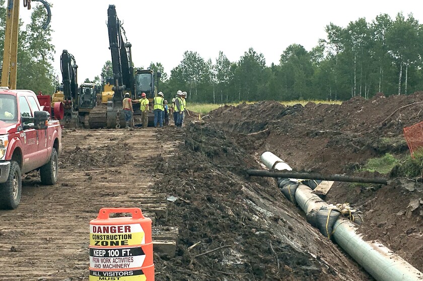 Enbridge Line 3 contractors were back to work following a protest at the site on Tuesday morning. The Douglas County Sheriff's Office responded to County Road W outside Oliver, arresting six protesters, said Sheriff Tom Dalbec. Brady Slater / bslater@duluthnews.com