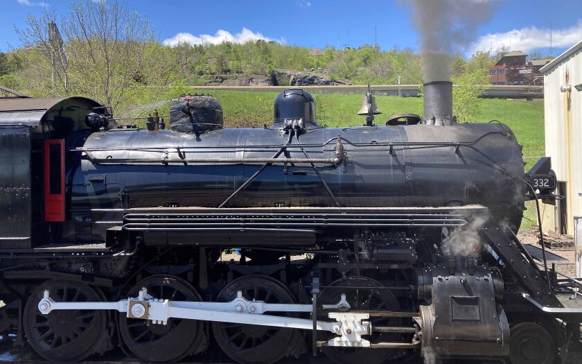Smoke coming out of a smokestack on a steam locomotive