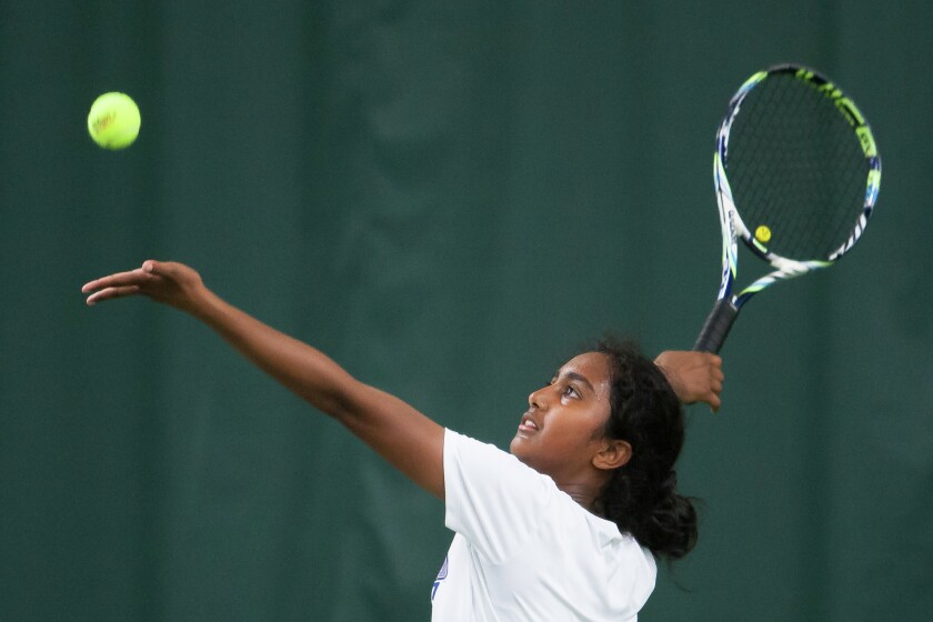 West Fargo Sheyenne's Preeti Chemiti serves at the North Dakota State Girls' Tennis Dual Tournament Championship match, held at Choice Health and Fitness in Grand Forks, N.D. on May 26, 2016. (Meg Oliphant/Forum News Service)