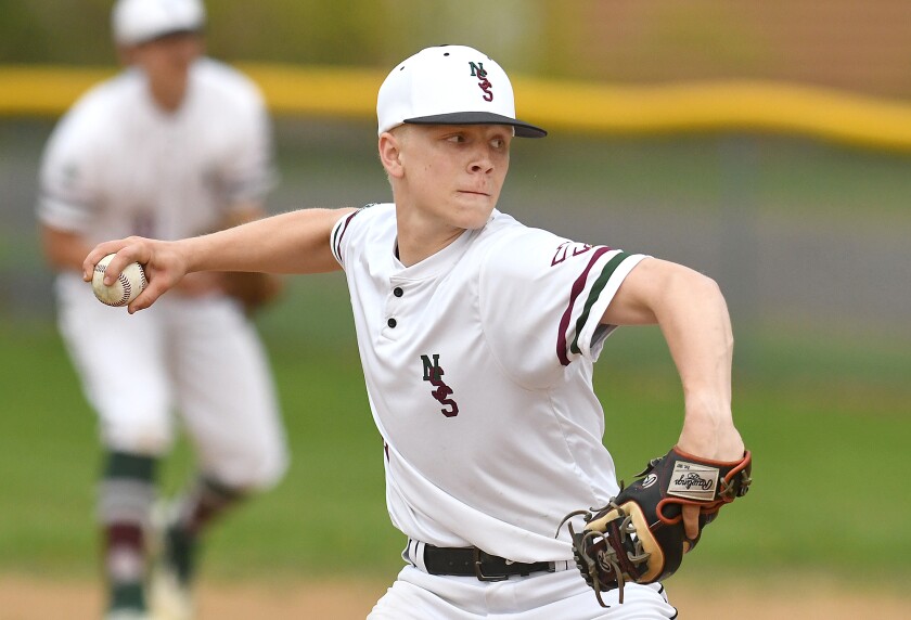 Player pitches ball.